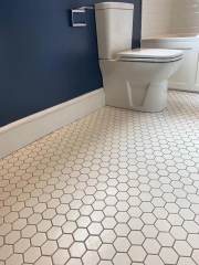 Hexagonal bathroom floor tiles, complete bathroom refurbishment Surrey and Sussex by Thomson Properties