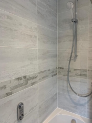 Bathroom refurbishment with tile border, Thomson Properties