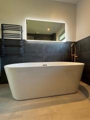 Freestanding bath Cranleigh bathroom fitter Surrey Sussex Thomson Properties