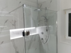 Illuminated bathroom niche, bathroom refurbishment by Thomson Properties, Kitchen & Bathroom Refurbishment Specialists in Surrey and Sussex