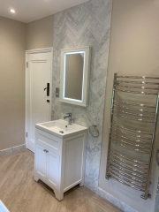Herringbone bathroom wall tiles - Thomson Properties