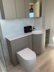 Bathroom cabinets and storage within complete bathroom refurbishment by Thomson Properties, Surrey and Sussex