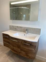 Wall hung bathroom units within bathroom refurbishment by Thomson Properties,  Kitchen & Bathroom Refurbishment Specialists in Surrey and Sussex