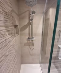 Refurbished shower area with neutral colour tiles, Thomson Properties