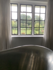 Freestanding bath with a view, luxury bathroom specialist, Thomson Properties, Surrey and Sussex