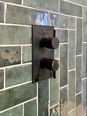Black bathroom fittings with metro wall tiles, Thomson Properties