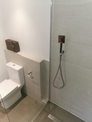 Black bathroom fittings within complete bathroom refurbishment by Thomson Properties