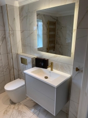 Bathroom light installation and complete refurbishment by Thomson Properties