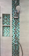 Mosaic tiling in shower room refurbishment by Thomson Properties, Surrey and Sussex