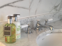 Marble tiled bathroom refurbishment, Thomson Properties, Surrey and Sussex