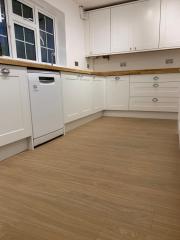 White shaker style kitchen remodel by Thomson Properties