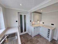 White utility room refurbishment by Thomson Properties