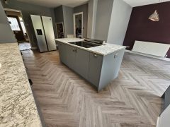 Herringbone kitchen flooring and kitchen island - kitchen refurbishment by Thomson Properties, kitchen and bathroom refurbishment specialists