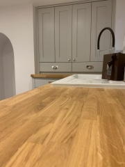 Utility room refurbishment with wood worktops and grey cupboards, Thomson Properties
