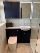Bathroom refurbishment with illuminated mirror, Thomson Properties
