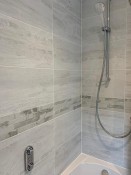 Bathroom refurbishment with tile border, Thomson Properties