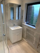 Grey bathroom installation Surrey Thomson Properties
