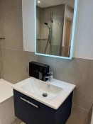 Bathroom installation, wall hung basin and unit, Thomson Properties, Surrey and Sussex