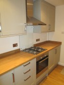 Shaker style kitchen refurbishment with wooden worktops and flooring, Thomson  Properties