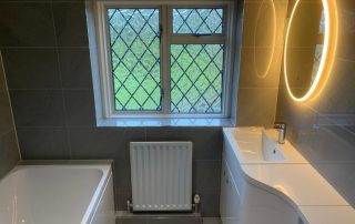 Illuminated mirror, bathroom fitters Surrey and Sussex, Thomson Properties