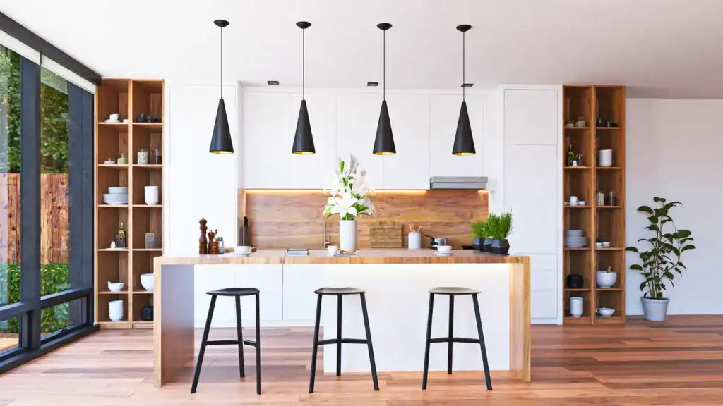 Bright kitchen with island seating and pendant lights